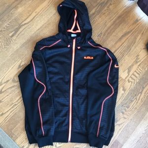 Nike black with orange jacket